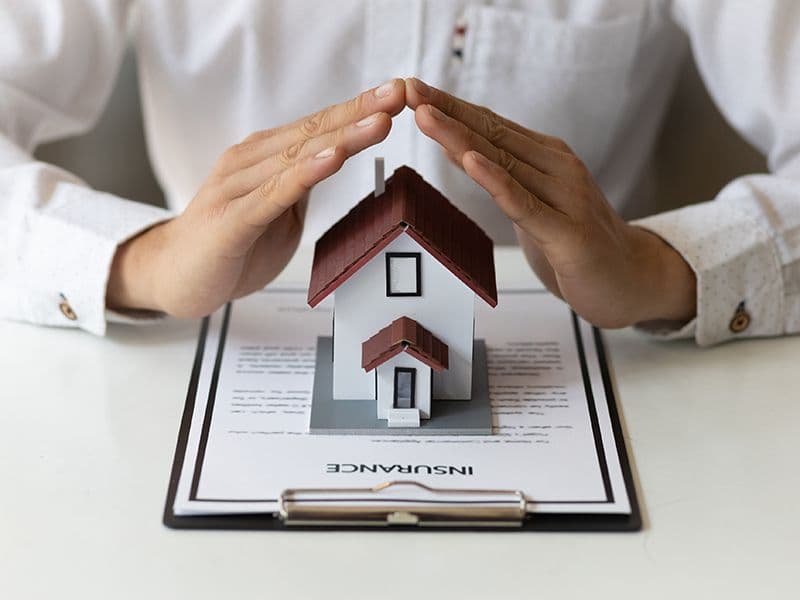 Florida homeowner researching whether roof rejuvenation is a scam